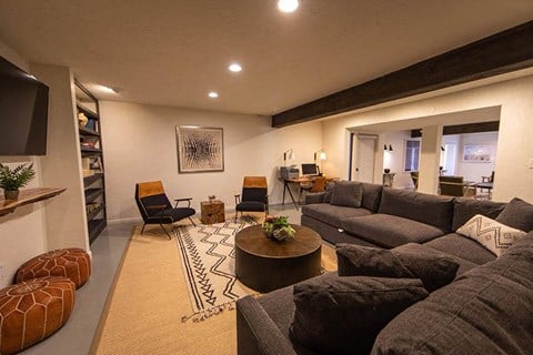 a living room with couches and a coffee table